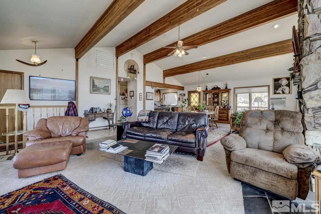 16500 Toll Road Reno, NV 89521 - Photo 6 of 25 a living room with furniture and a rug