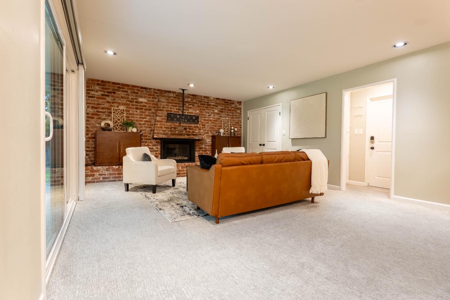 4631 Nickles Way Sacramento, CA 95864 - Photo 17 of 40 a living room with furniture a fireplace and a flat screen tv