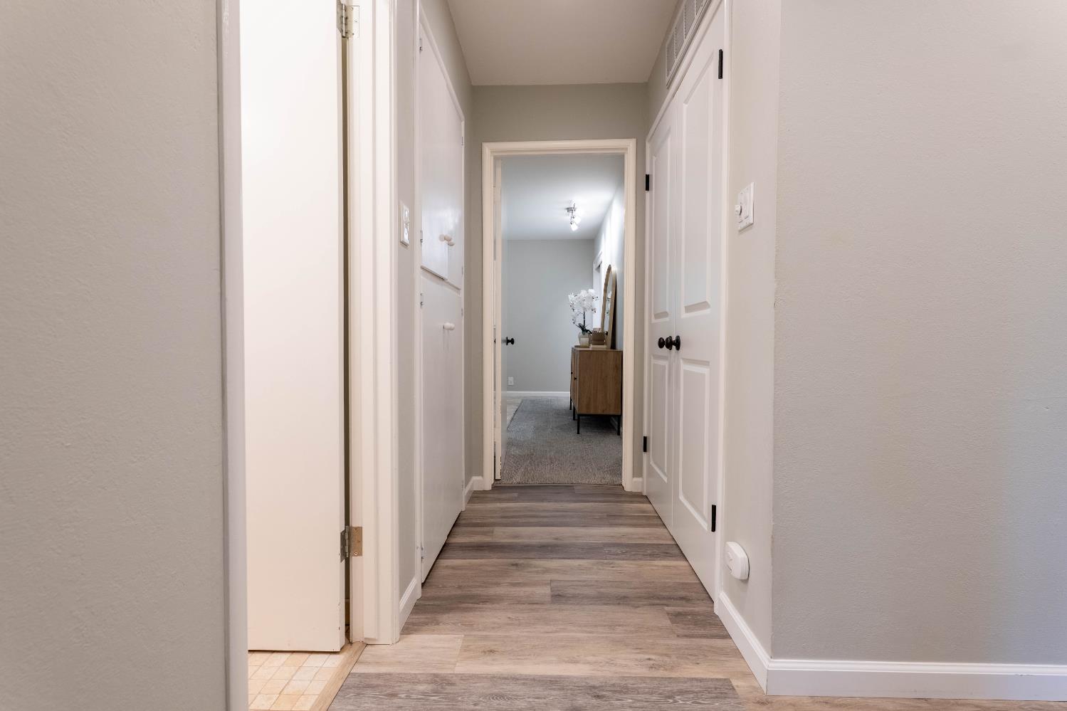 4631 Nickles Way Sacramento, CA 95864 - Photo 23 of 40 a view of a hallway with a wooden door