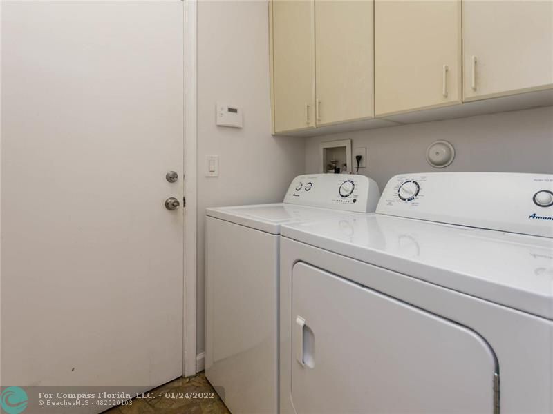 6334 Northwest 24th Street Boca Raton, FL 33434 - Photo 26 of 45 a utility room with dryer and washer