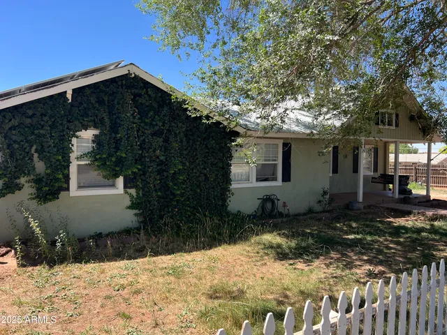 a front view of house with yard
