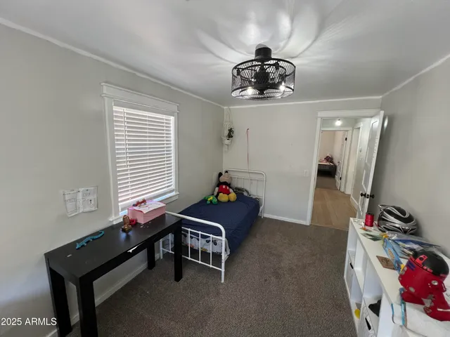 a room with toys and a window