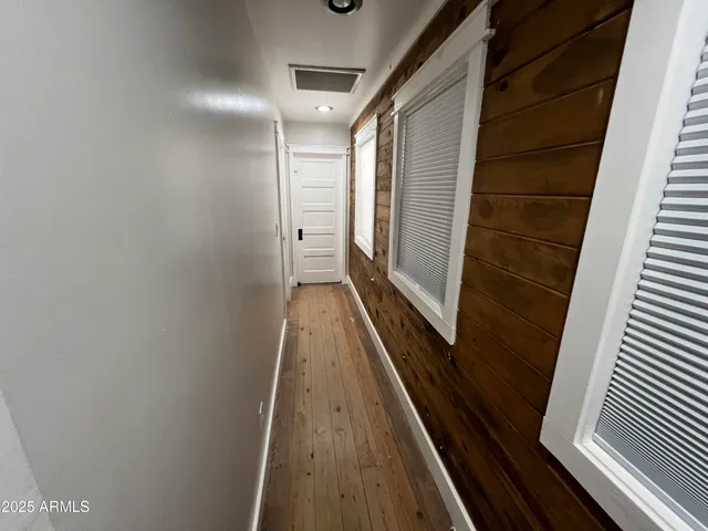 a white stove top oven sitting inside of a kitchen