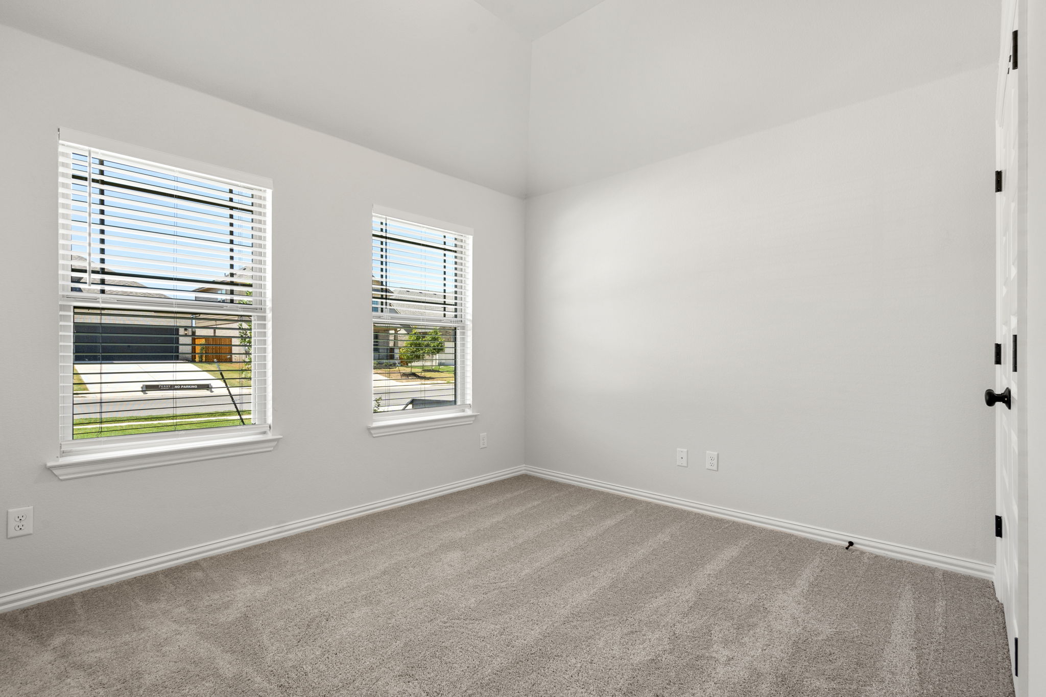 341 Fawn Riv Run Kyle, TX 78640 - Photo 16 of 29 Spare room with baseboards and carpet floors