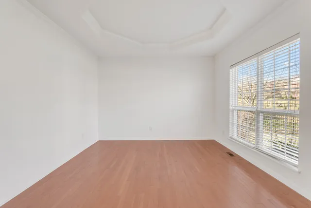 a view of a room that has a window in it