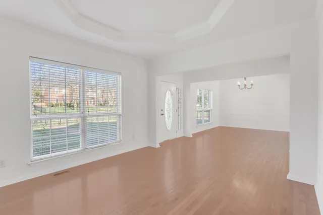 a view of empty room with windows