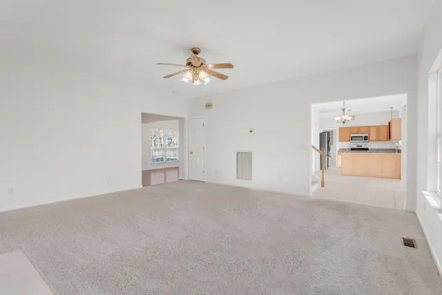 a view of a kitchen with a sink and a kitchen