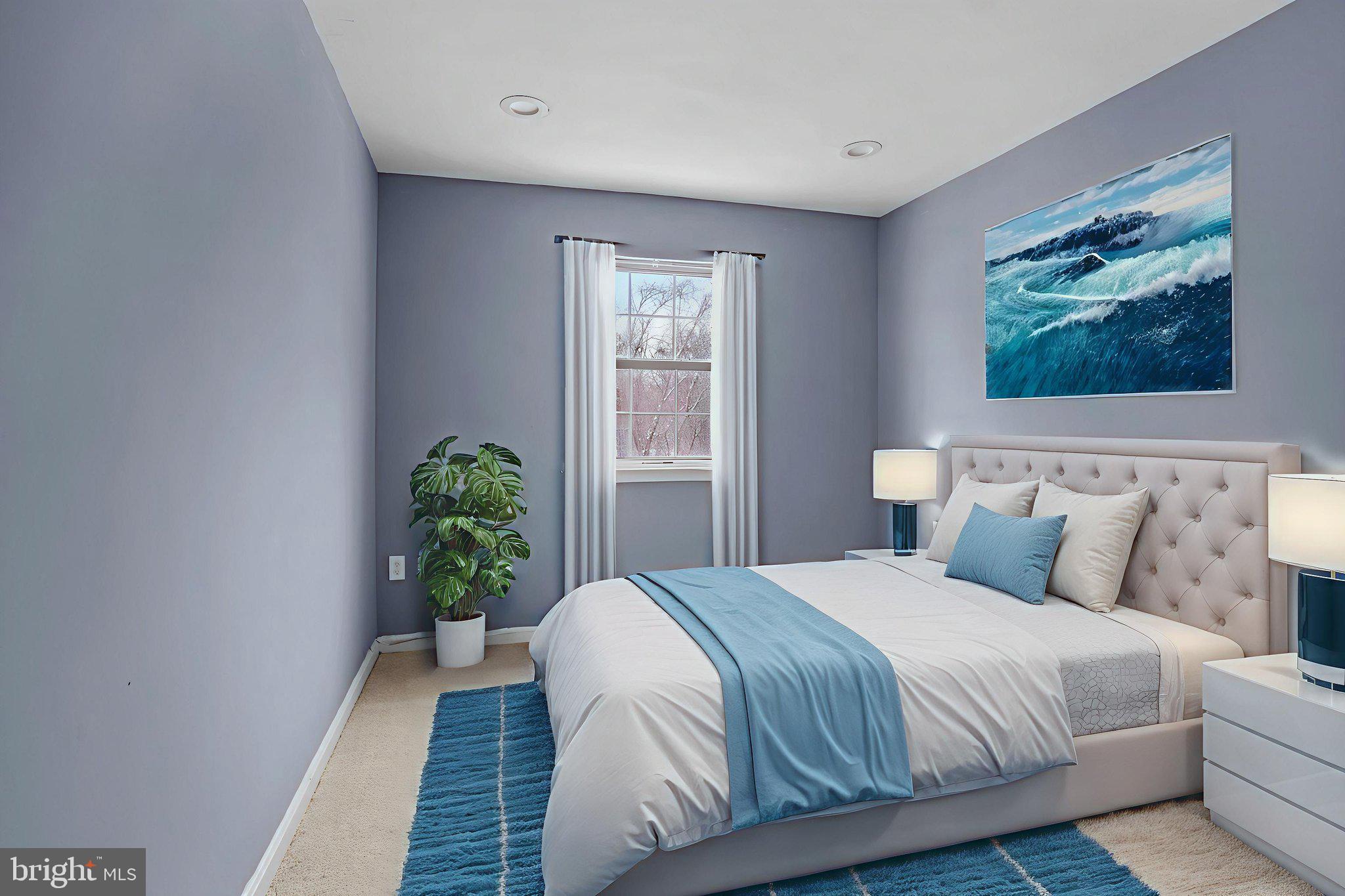 11206 Hannah Way, Unit 4 Upper Marlboro, MD 20774 - Photo 17 of 25 a bedroom with bed and large window