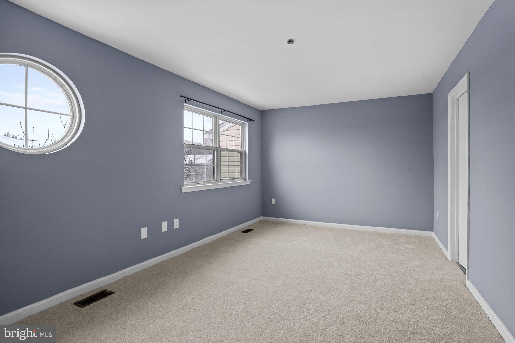 11206 Hannah Way, Unit 4 Upper Marlboro, MD 20774 - Photo 18 of 25 an empty room with a window