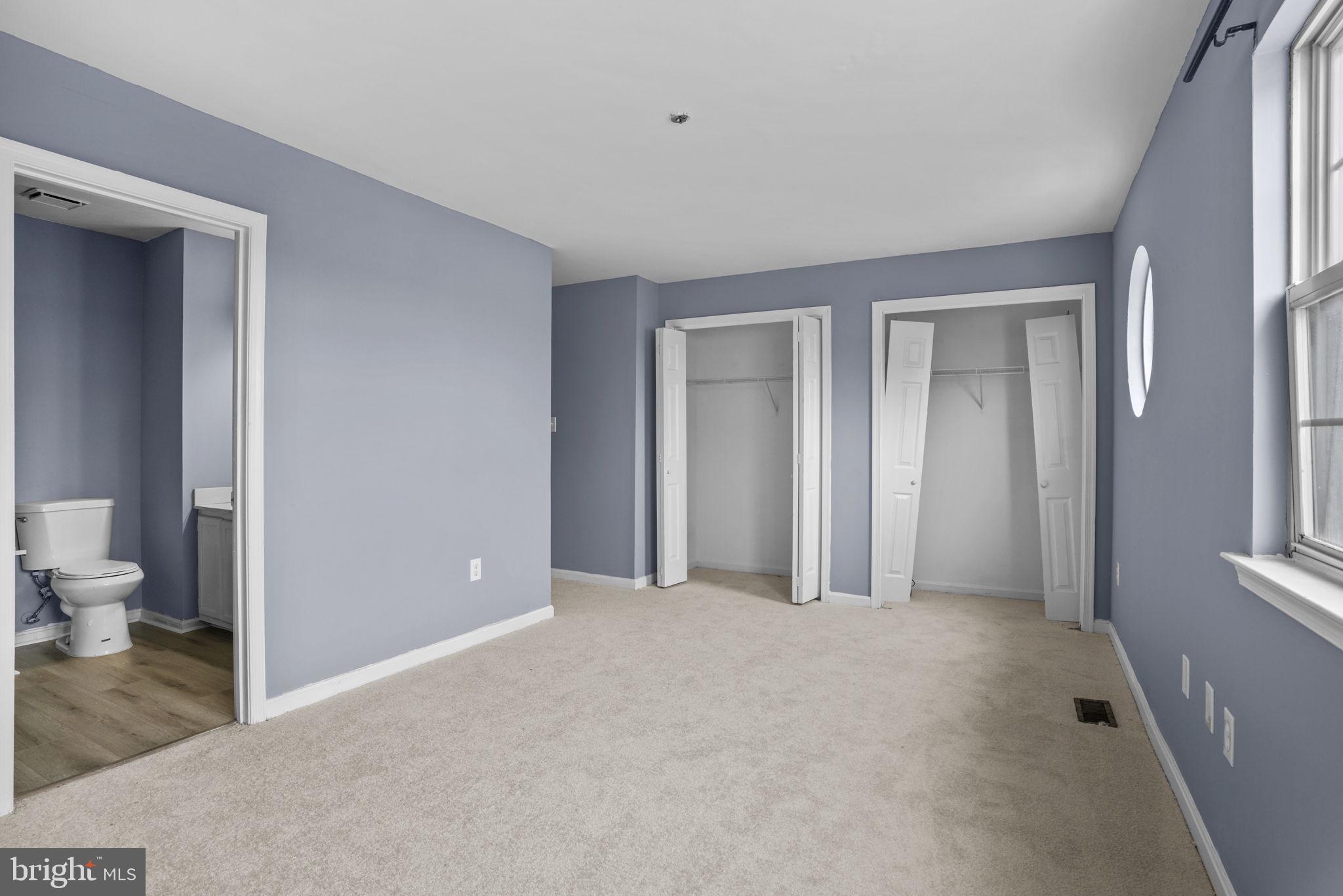 11206 Hannah Way, Unit 4 Upper Marlboro, MD 20774 - Photo 20 of 25 a view of a room with a wardrobe space