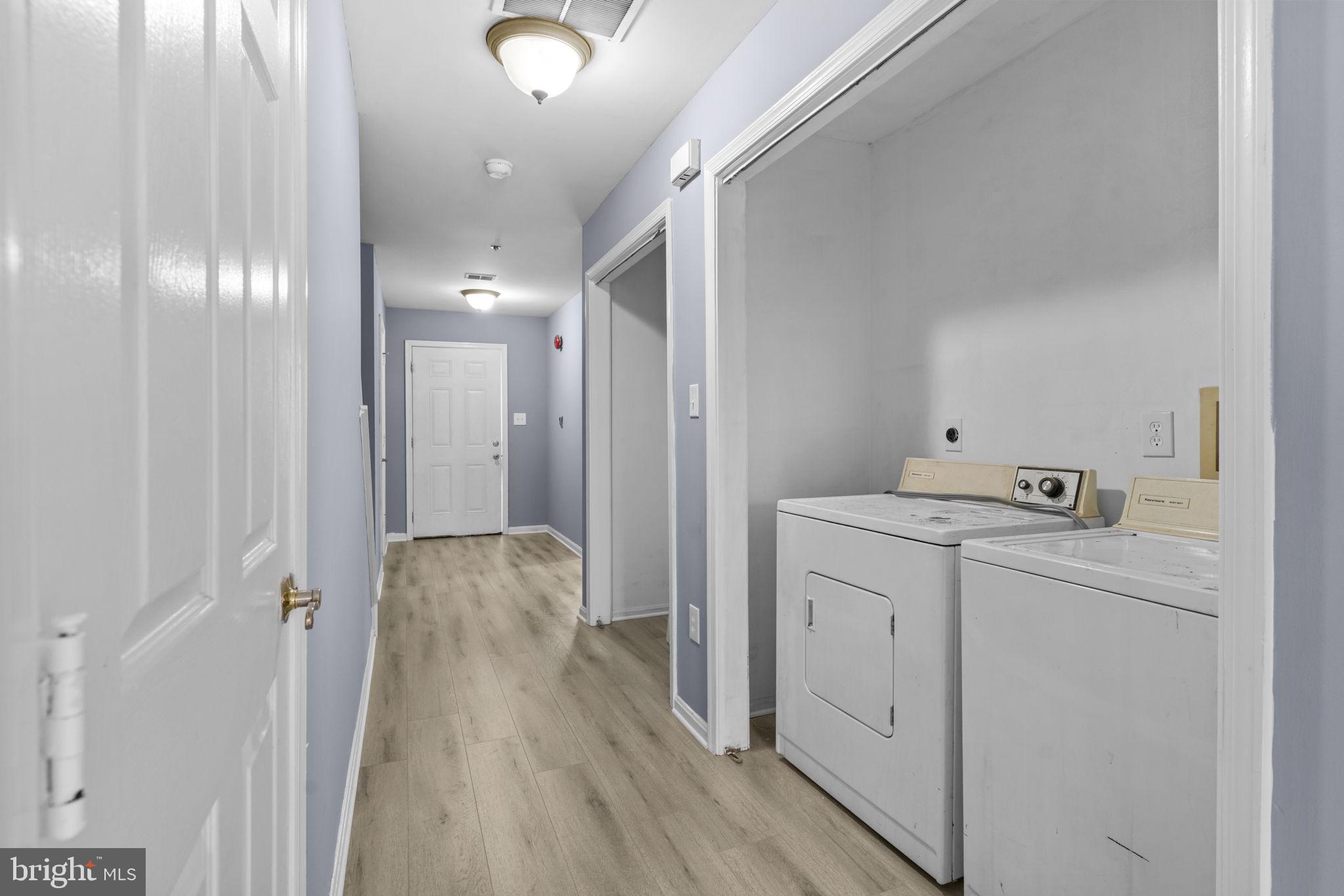 11206 Hannah Way, Unit 4 Upper Marlboro, MD 20774 - Photo 25 of 25 a view of hallway with wooden floor