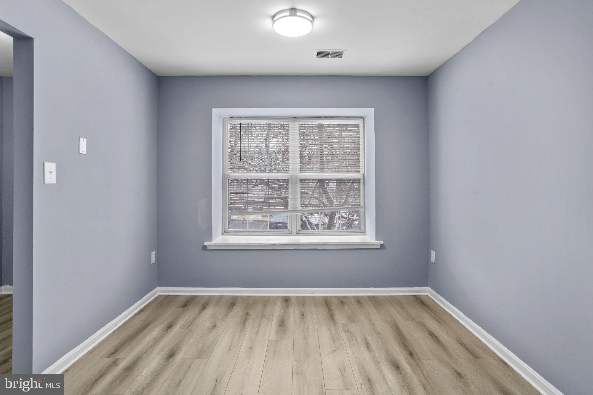 11206 Hannah Way, Unit 4 Upper Marlboro, MD 20774 - Photo 9 of 25 an empty room with a window