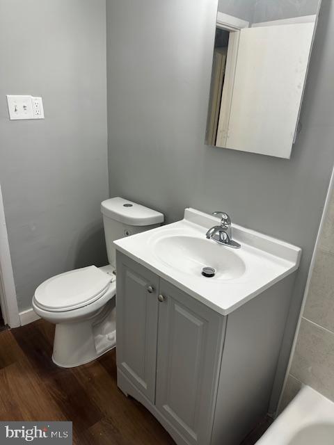 44 49th Street Southeast, Unit 302 Washington, DC 20019 - Photo 21 of 44 a white toilet sitting next to a bathroom sink