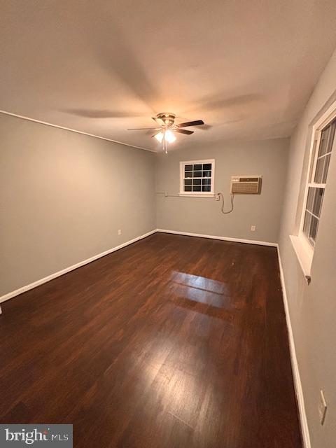 44 49th Street Southeast, Unit 302 Washington, DC 20019 - Photo 26 of 44 an empty room with a ceiling fan and window