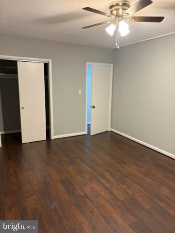 44 49th Street Southeast, Unit 302 Washington, DC 20019 - Photo 31 of 44 a view of an empty room with wooden floor and fan
