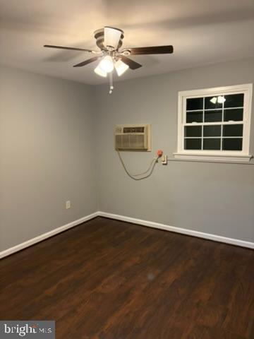 44 49th Street Southeast, Unit 302 Washington, DC 20019 - Photo 33 of 44 an empty room with wooden floor and windows