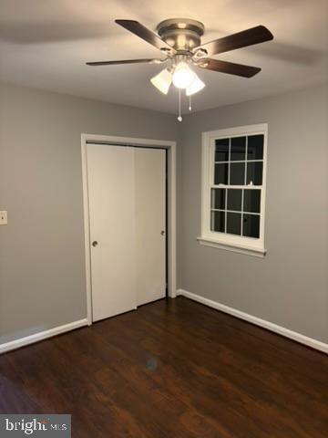44 49th Street Southeast, Unit 302 Washington, DC 20019 - Photo 34 of 44 a view of an empty room with wooden floor and a window
