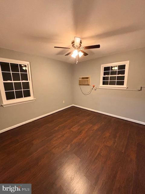44 49th Street Southeast, Unit 302 Washington, DC 20019 - Photo 35 of 44 an empty room with wooden floor windows and fan