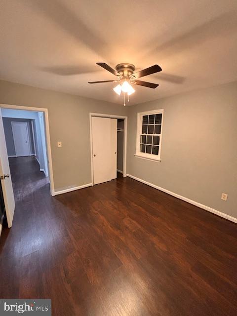 44 49th Street Southeast, Unit 302 Washington, DC 20019 - Photo 36 of 44 a view of an empty room with wooden floor and a ceiling fan