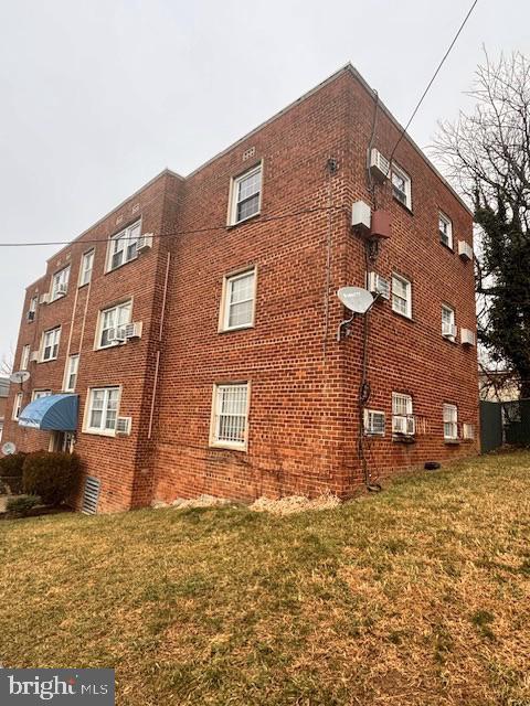 44 49th Street Southeast, Unit 302 Washington, DC 20019 - Photo 39 of 44 a brick building that has a lots of windows in it