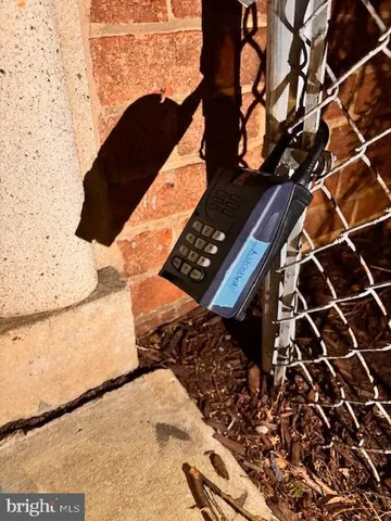a view of a balcony with wooden floor and windows