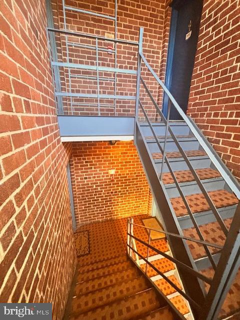 44 49th Street Southeast, Unit 302 Washington, DC 20019 - Photo 43 of 44 a view of a balcony with wooden floor and windows