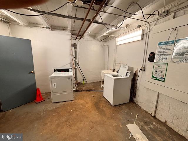 44 49th Street Southeast, Unit 302 Washington, DC 20019 - Photo 44 of 44 a view of a storage & utility room with washer and dryer