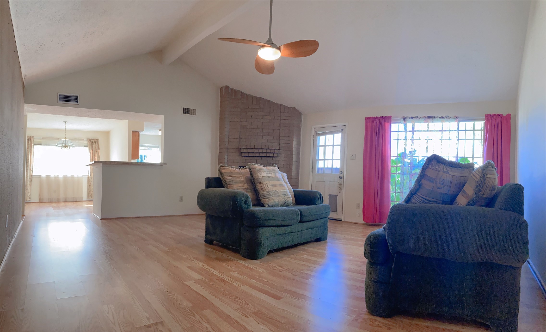 19518 Munsey Court Katy, TX 77449 - Photo 6 of 45 a living room with furniture and a chandelier