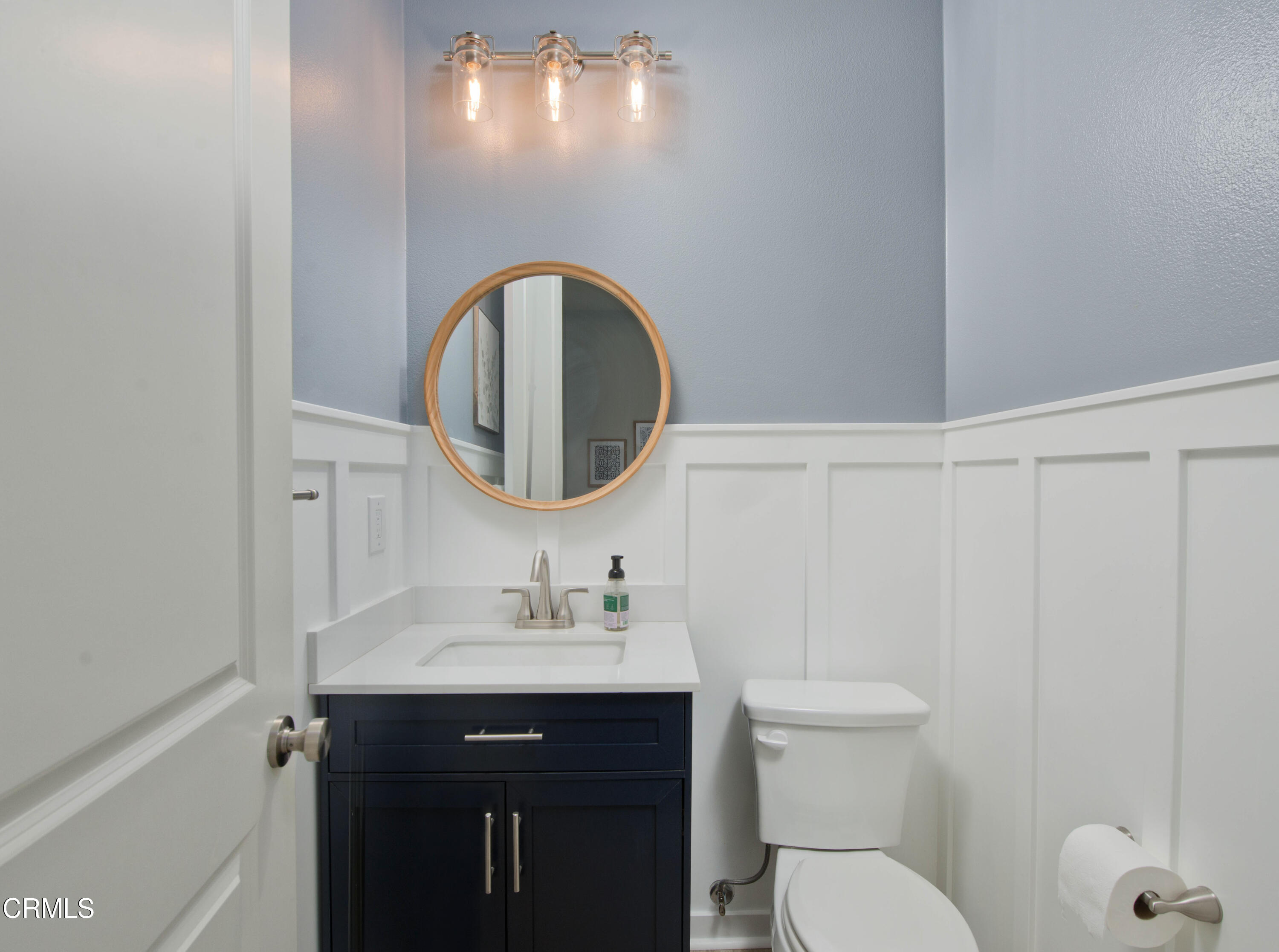 385 Azalea Street Fillmore, CA 93015 - Photo 18 of 50 a bathroom with a sink and a mirror