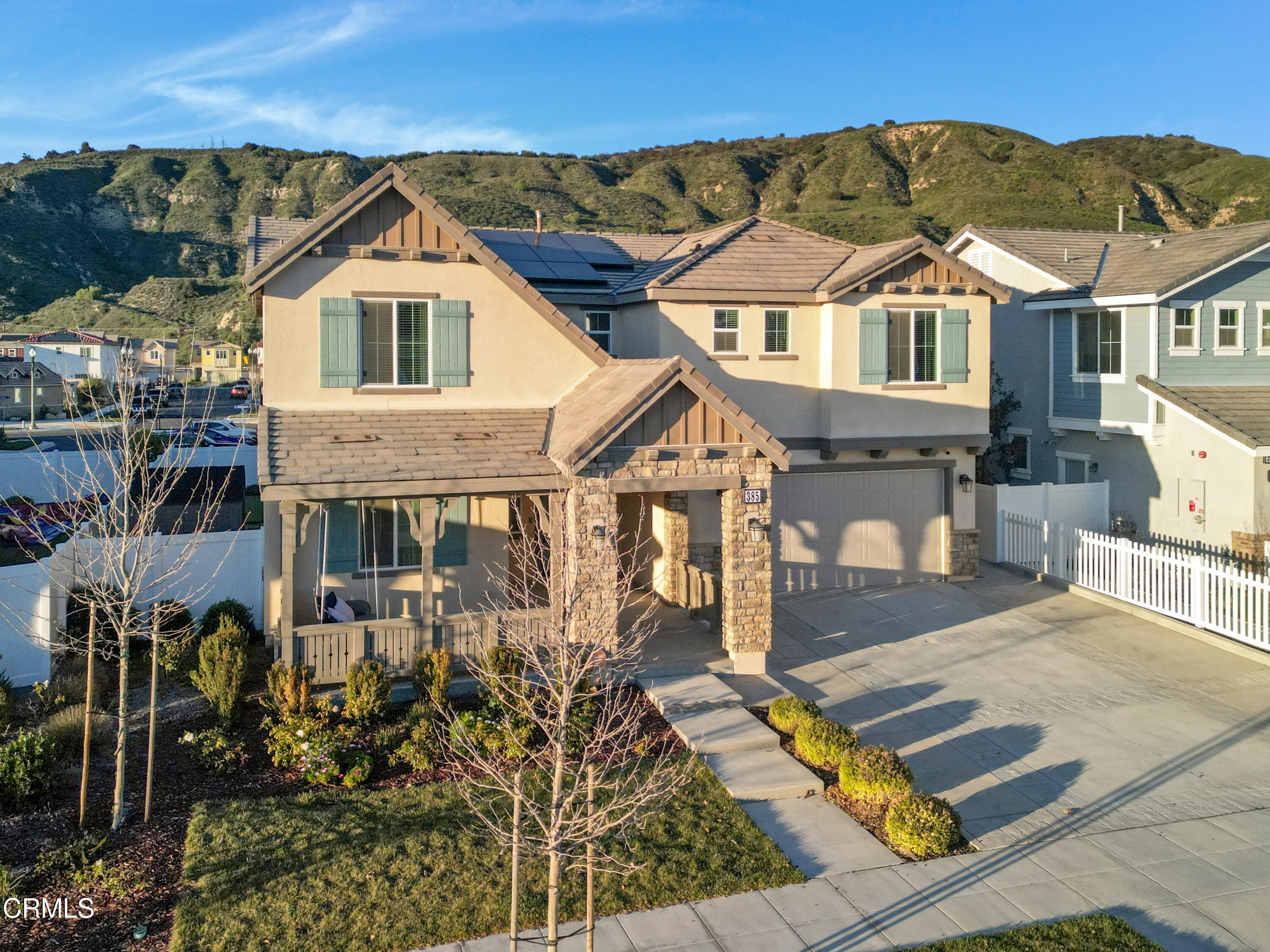 385 Azalea Street Fillmore, CA 93015 - Photo 2 of 50 a front view of a house with garden
