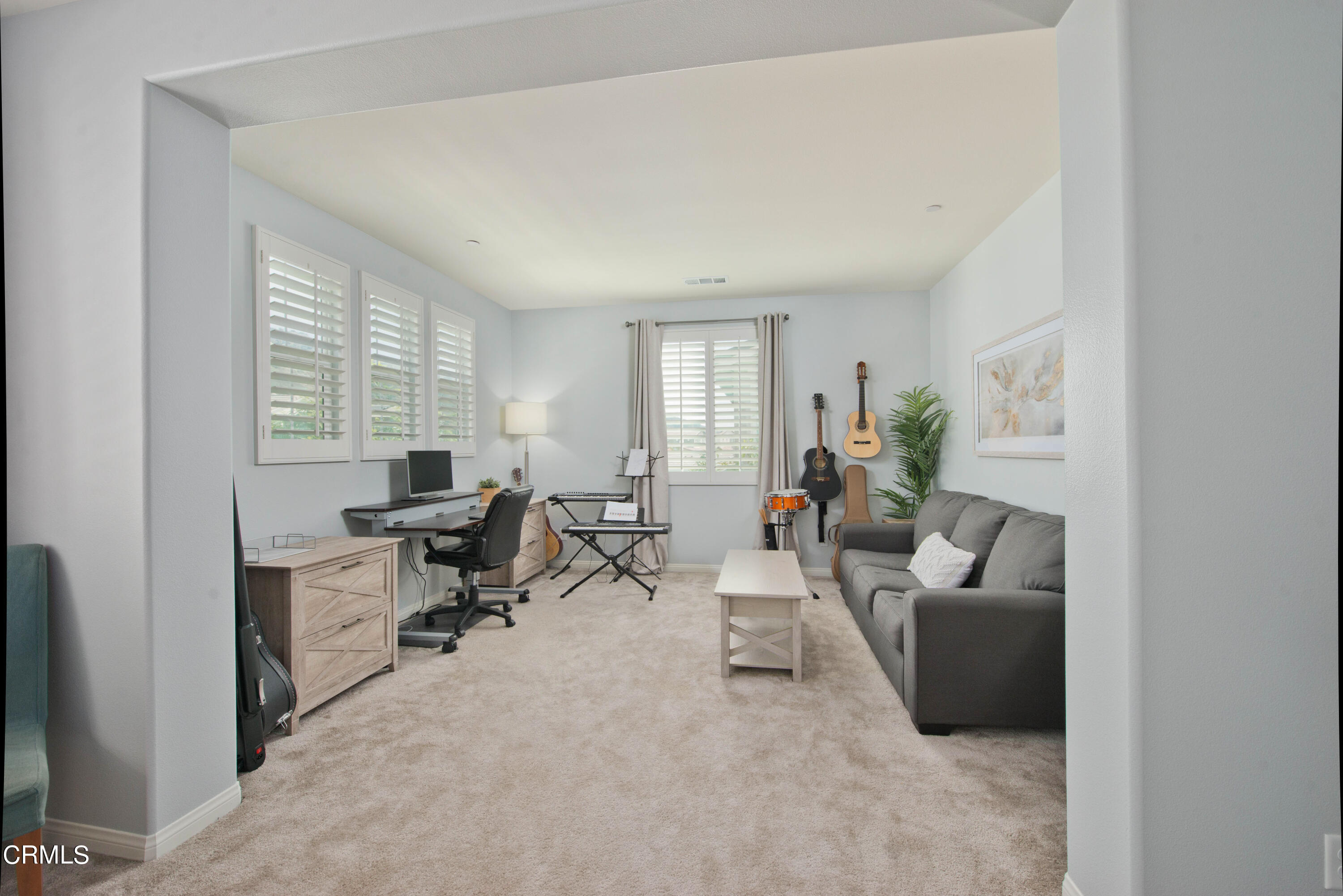 385 Azalea Street Fillmore, CA 93015 - Photo 29 of 50 a living room with furniture and a window