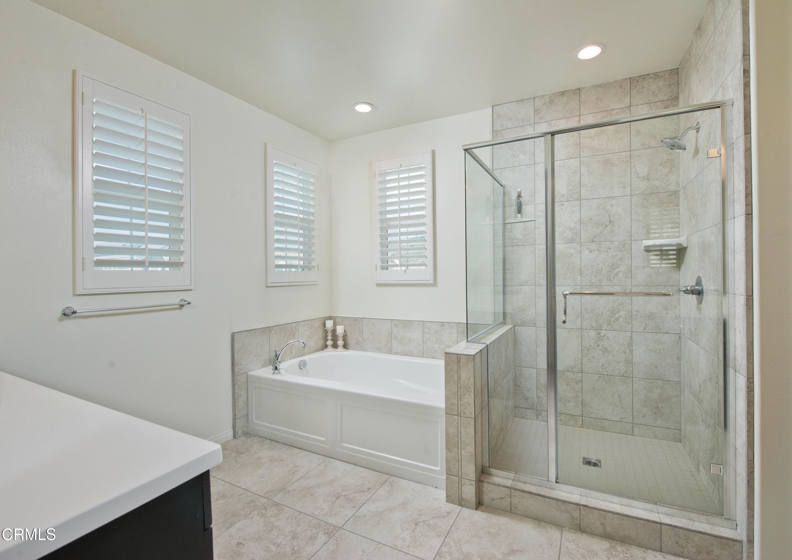 385 Azalea Street Fillmore, CA 93015 - Photo 32 of 50 a bathroom with a bathtub a shower and a sink