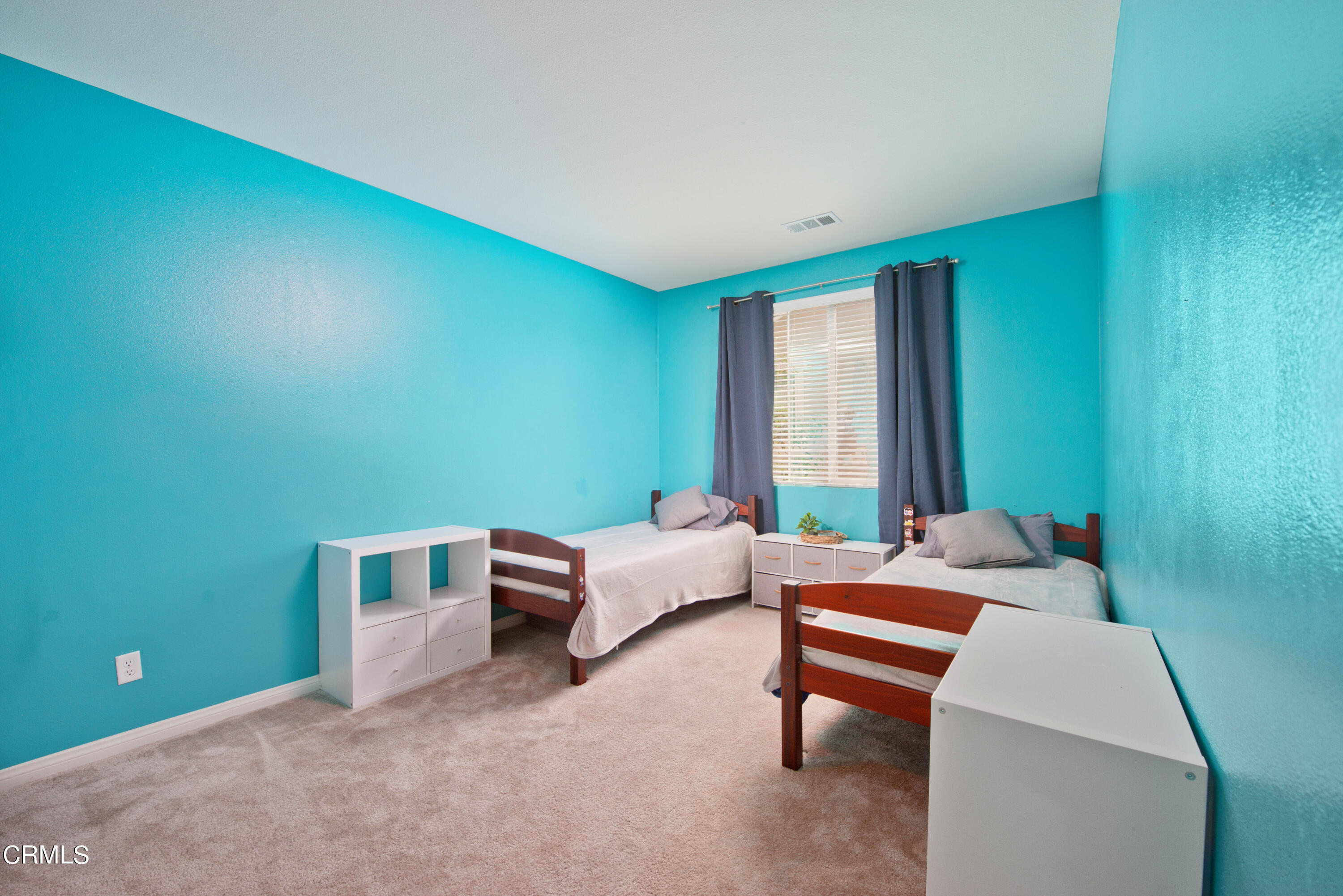 385 Azalea Street Fillmore, CA 93015 - Photo 37 of 50 a bedroom with a bed and a window