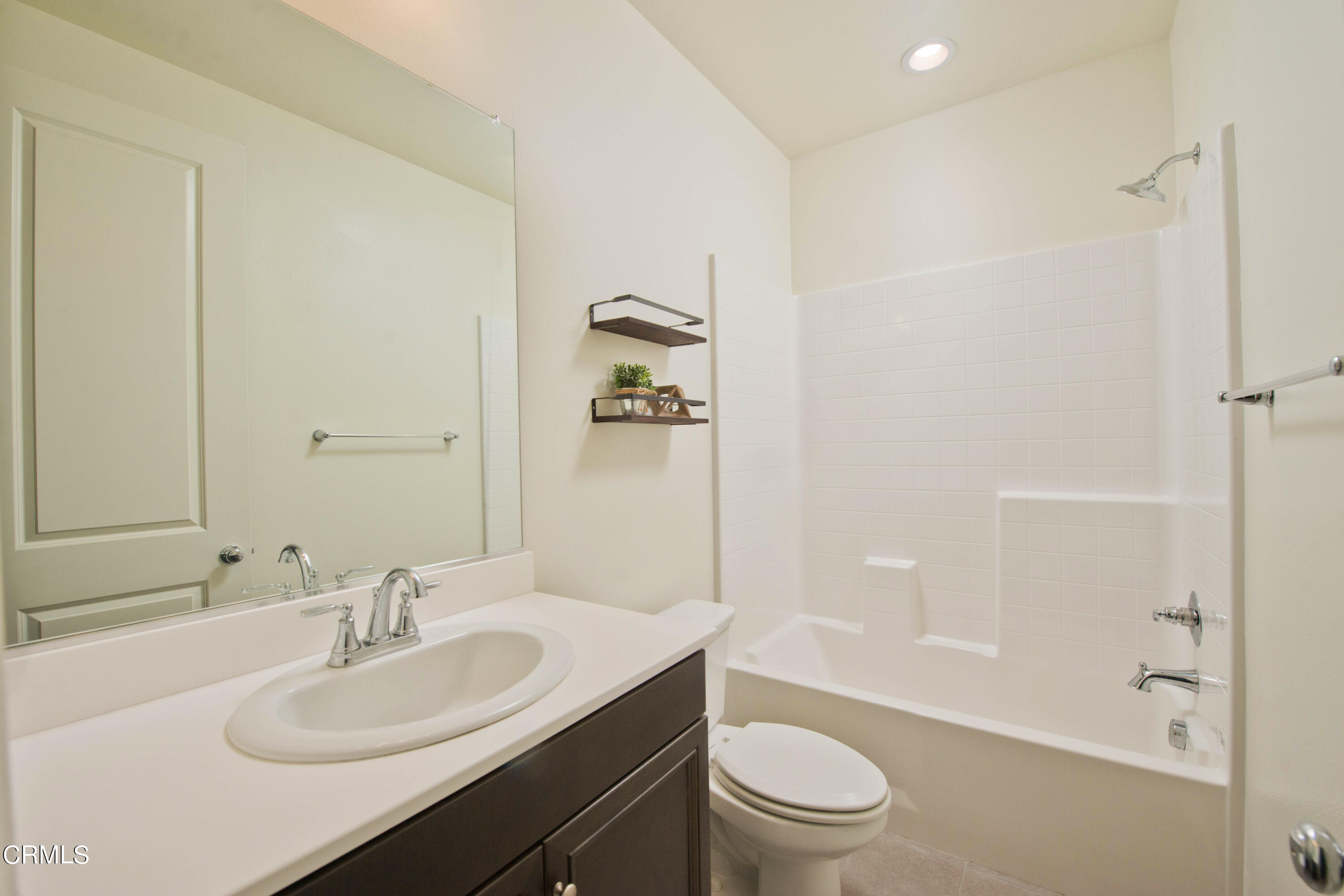 385 Azalea Street Fillmore, CA 93015 - Photo 38 of 50 a bathroom with a sink a toilet and shower