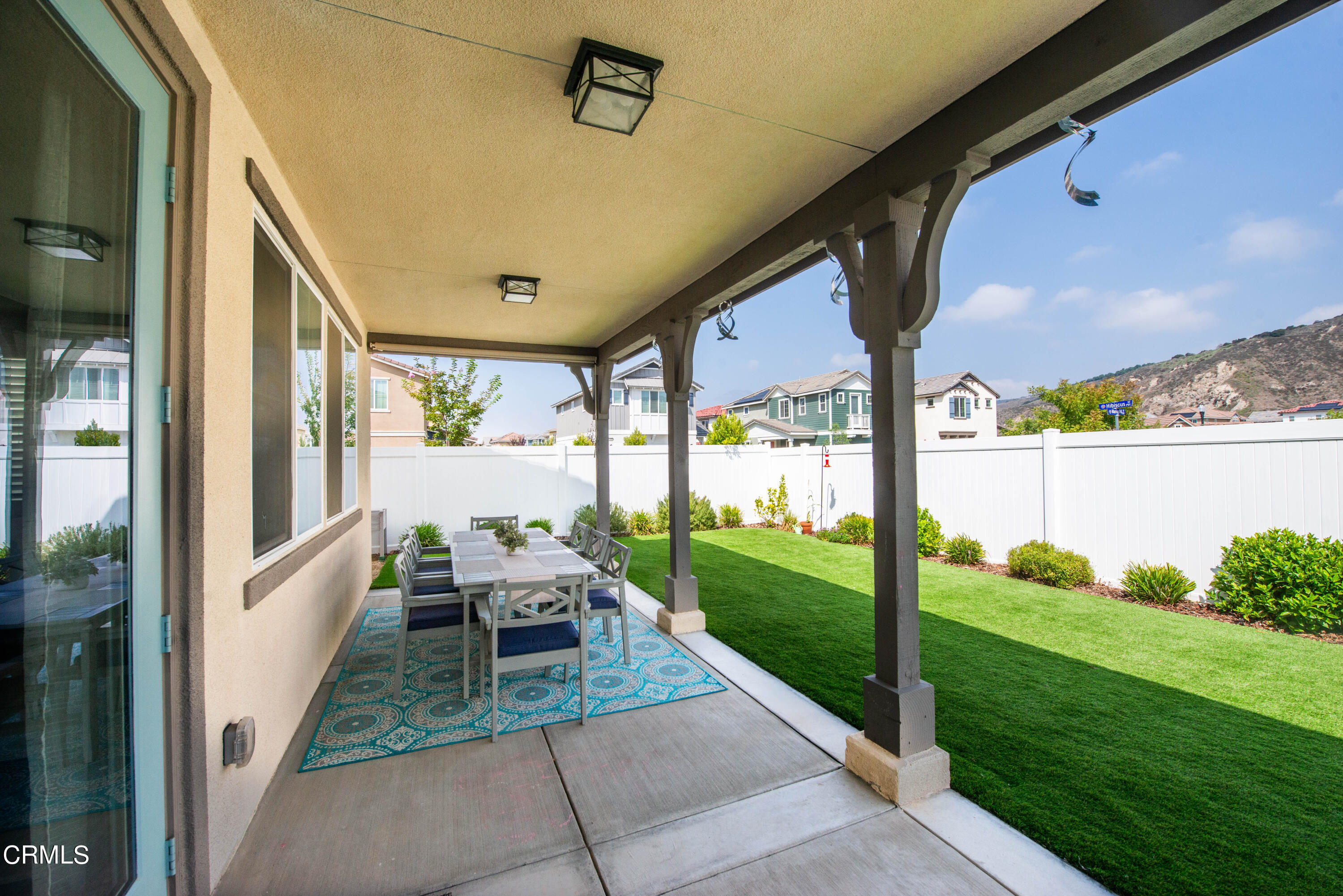 385 Azalea Street Fillmore, CA 93015 - Photo 41 of 50 a balcony with furniture and garden view
