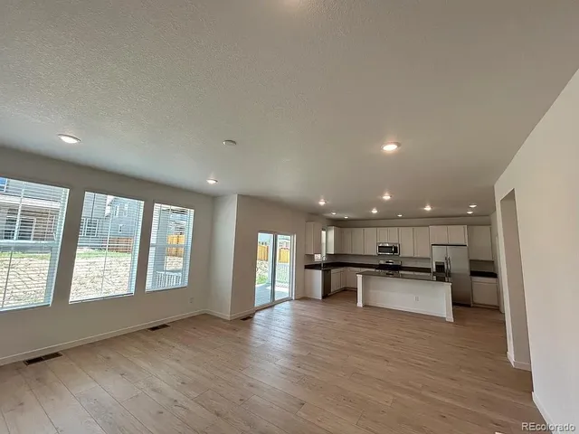 a view of a kitchen with a sink