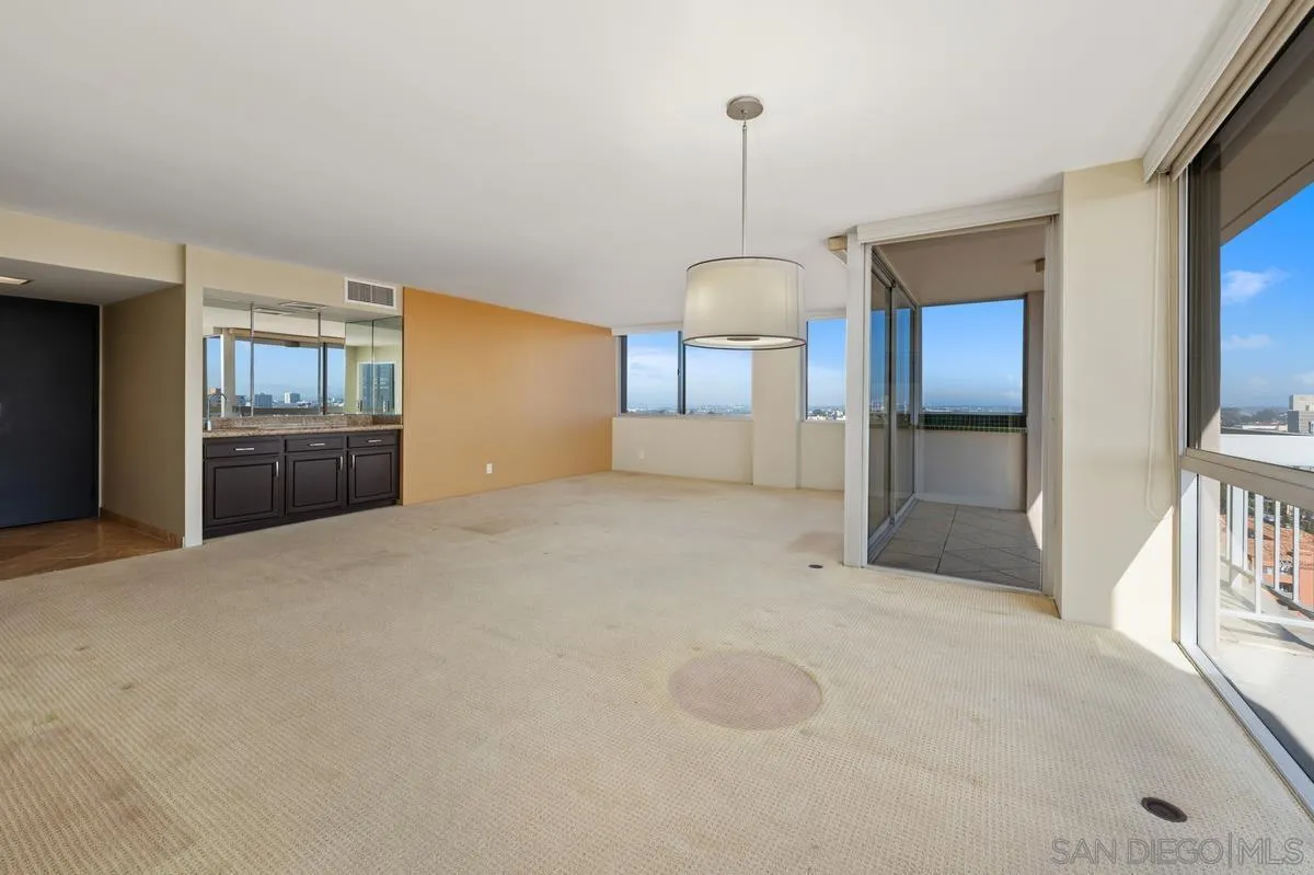 3535 1st Avenue, Unit 15A San Diego, CA 92103 - Photo 10 of 38 a view of empty room with a fireplace