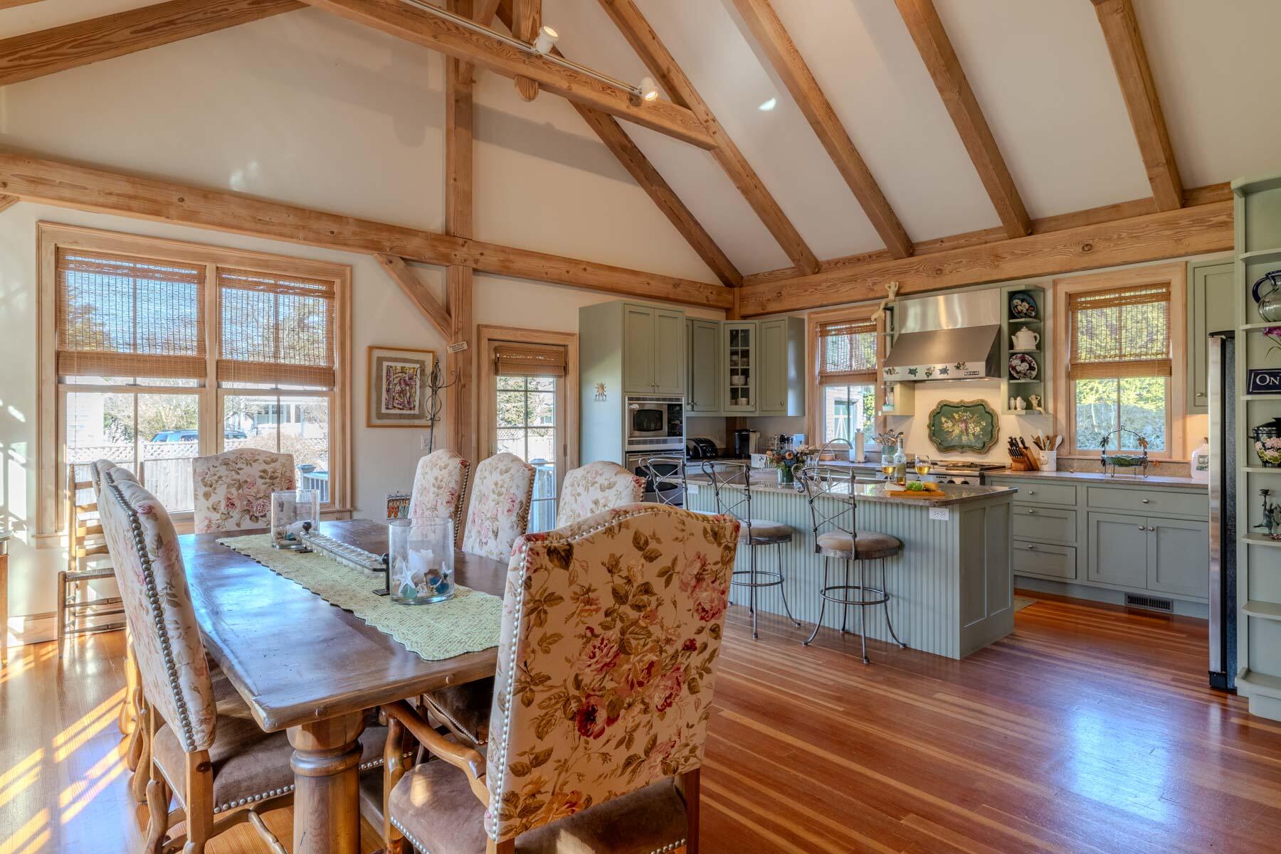 160 Katama Road Edgartown, MA 02539 - Photo 3 of 10 a view of a dining room with furniture window and wooden floor