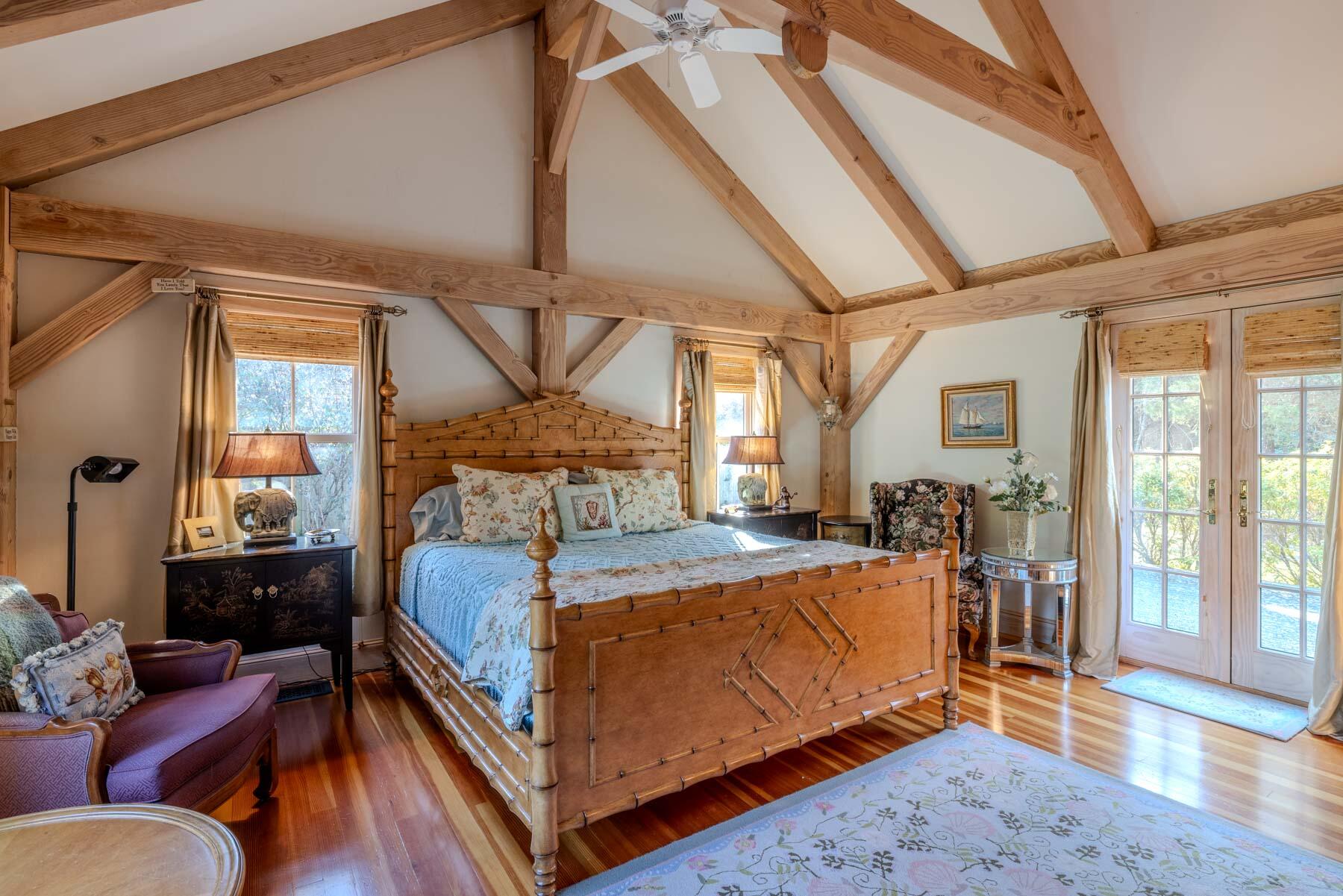 160 Katama Road Edgartown, MA 02539 - Photo 4 of 10 a bed room with a bed and a couch