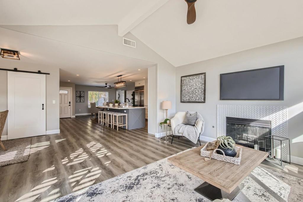 2015 Shadow Grove Way Encinitas, CA 92024 - Photo 11 of 27 a living room with furniture and a rug
