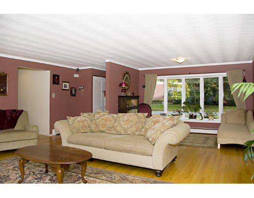 73 Joseph Road Framingham, MA 01701 - Photo 3 of 19 a living room with furniture and a large window