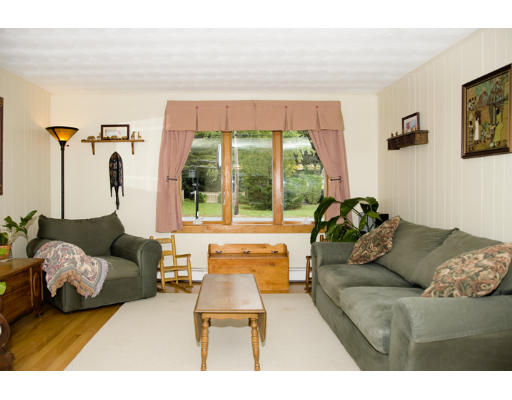 73 Joseph Road Framingham, MA 01701 - Photo 6 of 19 a living room with furniture and a large window