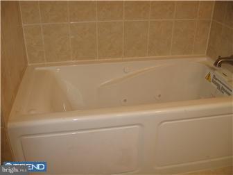 271 Copley Road Upper Darby, PA 19082 - Photo 7 of 12 a close view of a bathtub in a bathroom