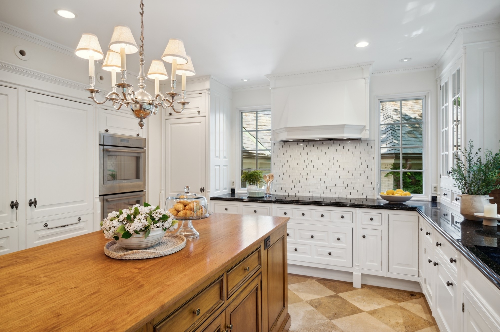 1140 Seneca Road Wilmette, IL 60091 - Photo 15 of 65 a kitchen with cabinets a sink and dishwasher