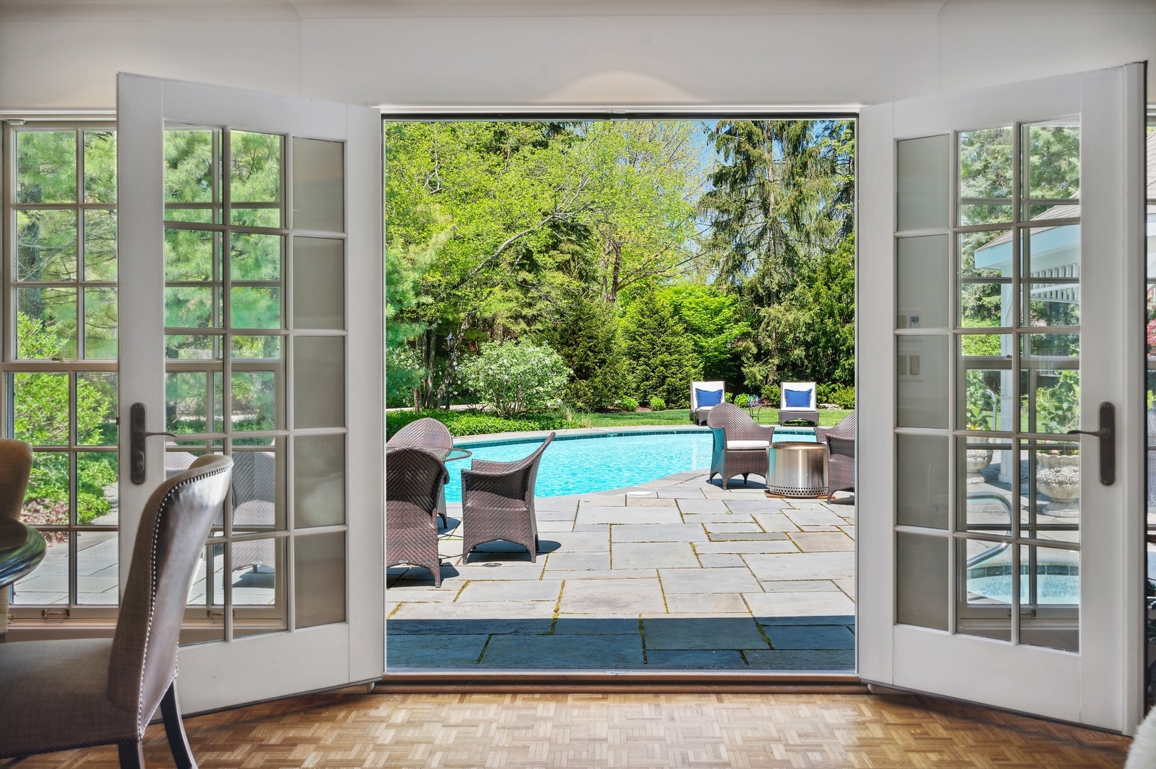 1140 Seneca Road Wilmette, IL 60091 - Photo 21 of 65 a living room with patio furniture and a garden