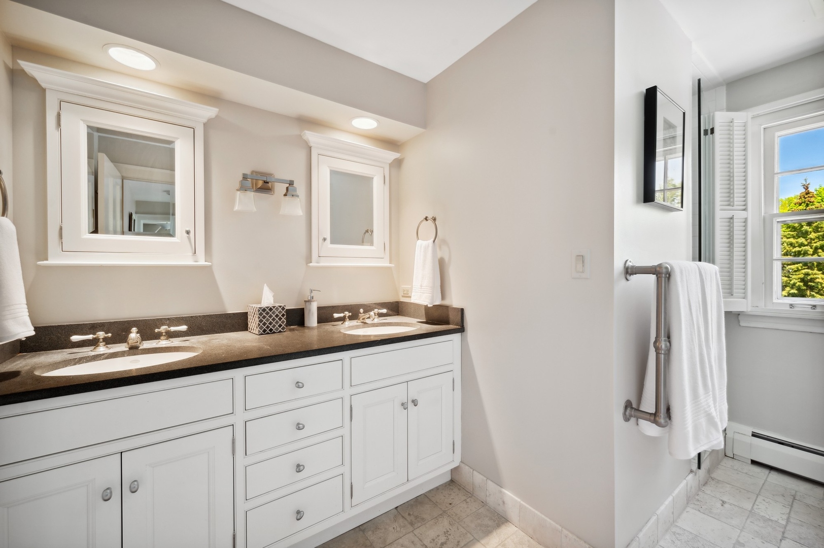 1140 Seneca Road Wilmette, IL 60091 - Photo 43 of 65 a hall with a sink and a mirror