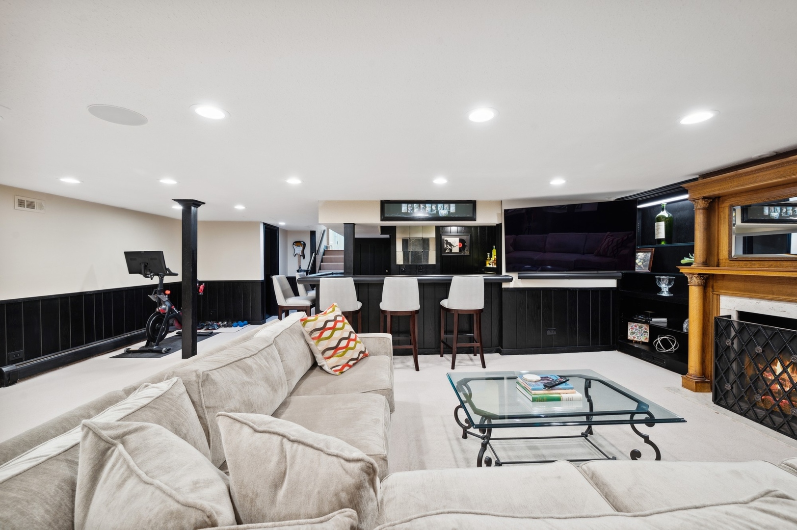 1140 Seneca Road Wilmette, IL 60091 - Photo 47 of 65 a living room with furniture kitchen view and a flat screen tv