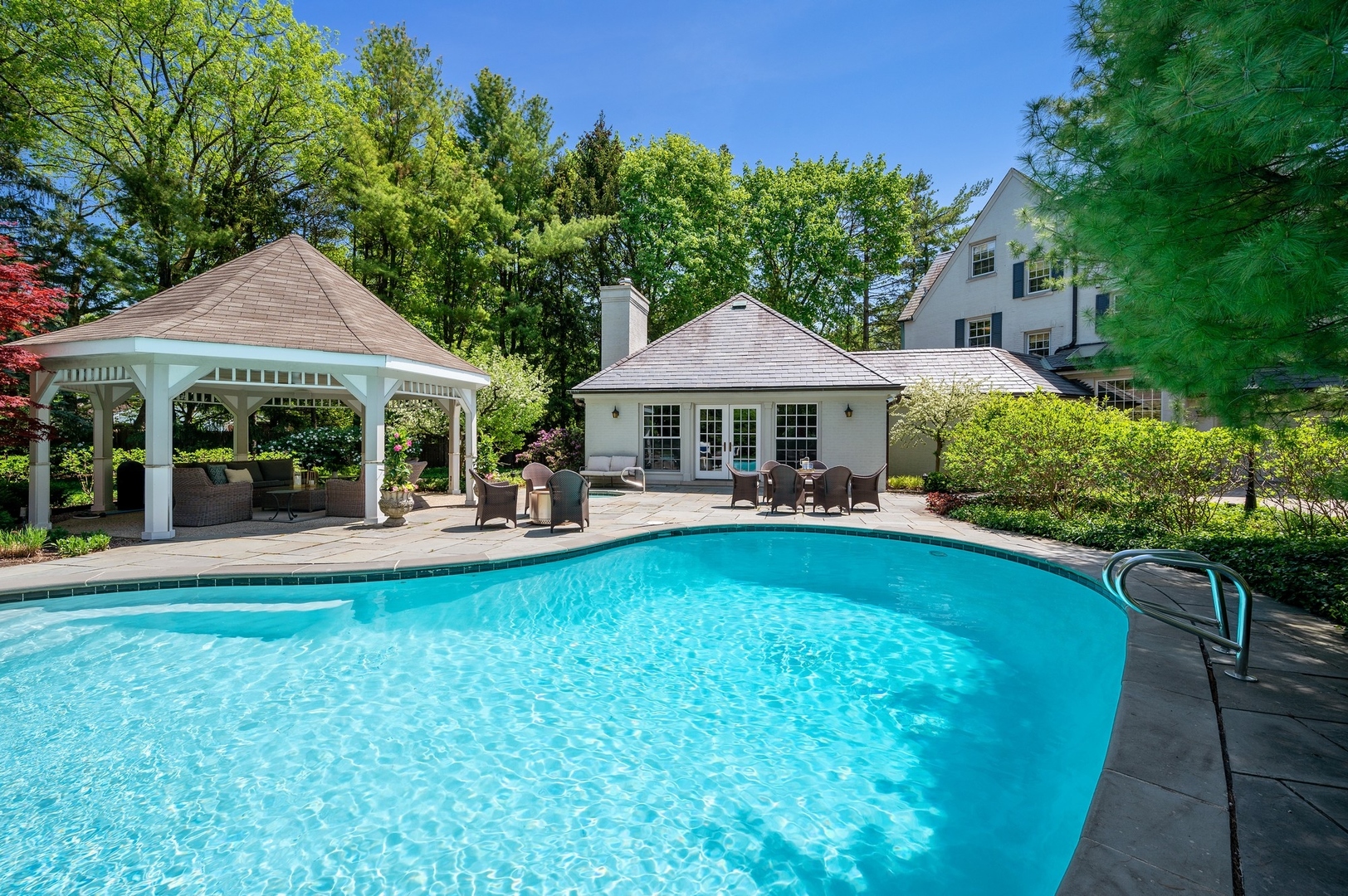 1140 Seneca Road Wilmette, IL 60091 - Photo 55 of 65 a view of a house with a yard patio and swimming pool