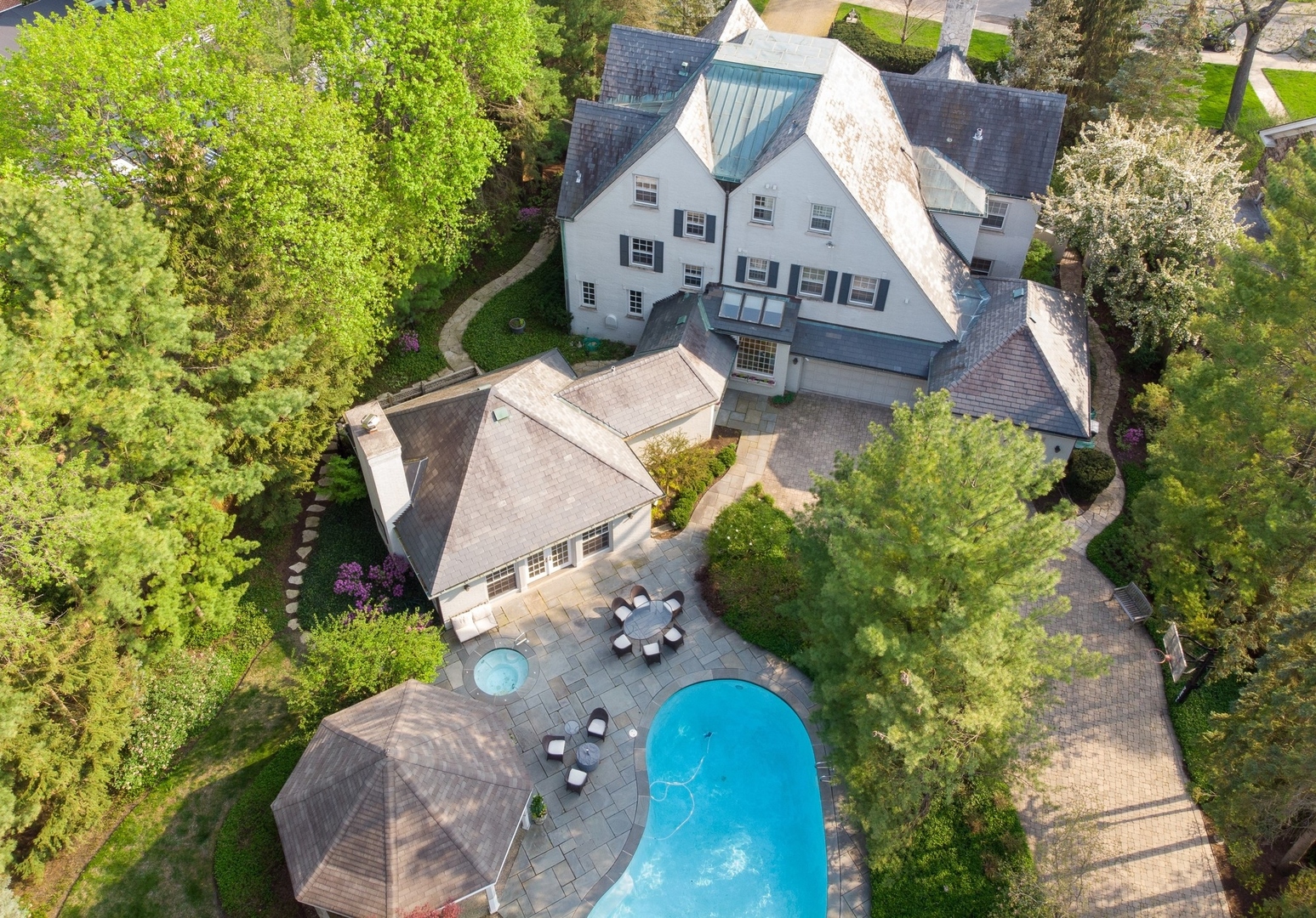 1140 Seneca Road Wilmette, IL 60091 - Photo 58 of 65 an aerial view of a house with a yard and trees