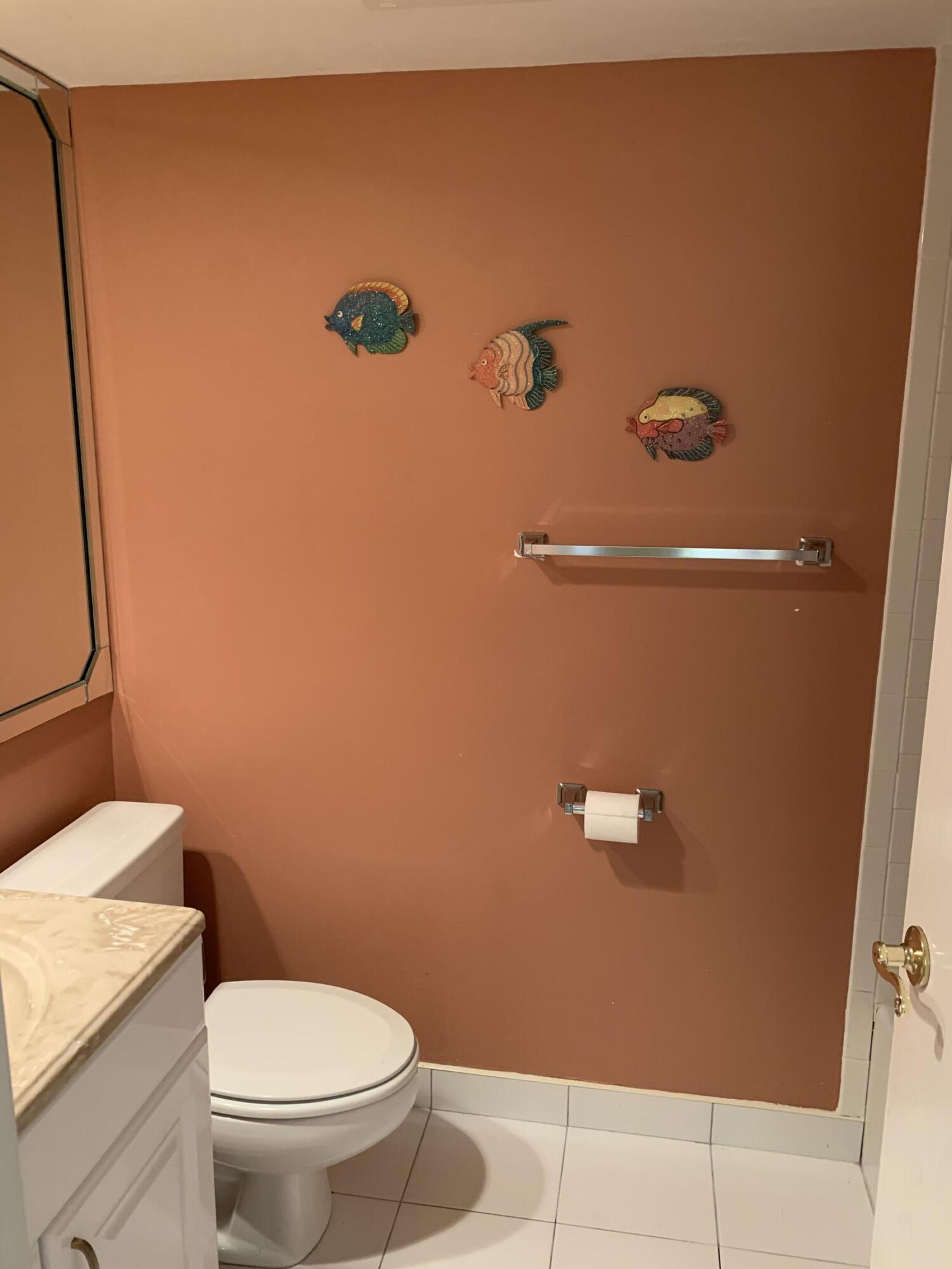 9403 South Ocean Drive, Unit 3D Jensen Beach, FL 34957 - Photo 15 of 15 a bathroom with a toilet